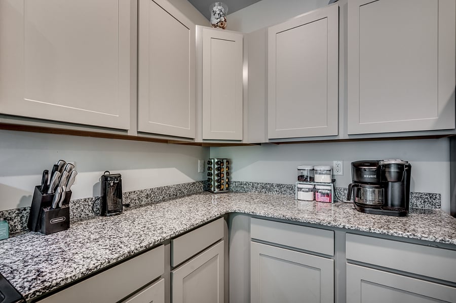 Fully equipped kitchen corner with a combo Keurig/drip coffee maker, knife block, and can openereverything you need for your morning brew and meal prep