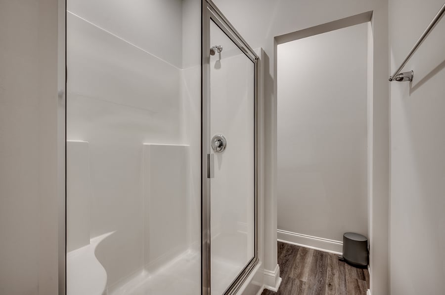 Walk-in shower with seating available and private water closet!