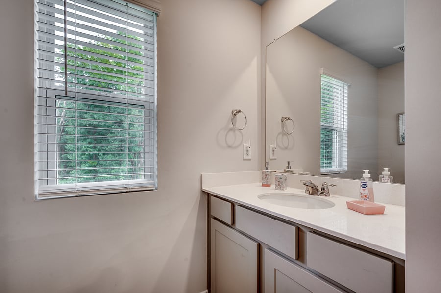Second upstairs bathroom in the hallway for the 2nd and 3rd bedrooms, featuring a convenient tub/shower combo.