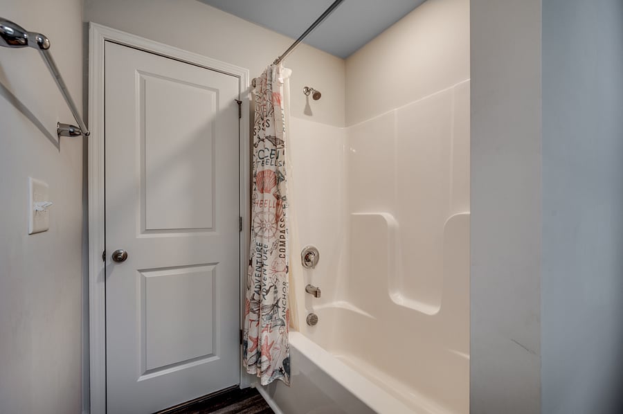 Second upstairs bathroom in the hallway for the 2nd and 3rd bedrooms, featuring a convenient tub/shower combo.