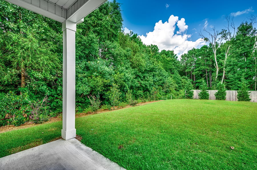 Spacious semi-private backyardone of the property's standout amenities, perfect for outdoor games, relaxation, or pets.