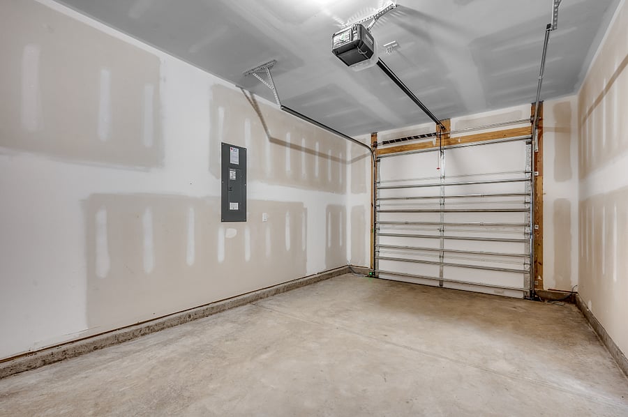 Neat and functional 1-car garage, offering space for your vehicle and additional storage options.