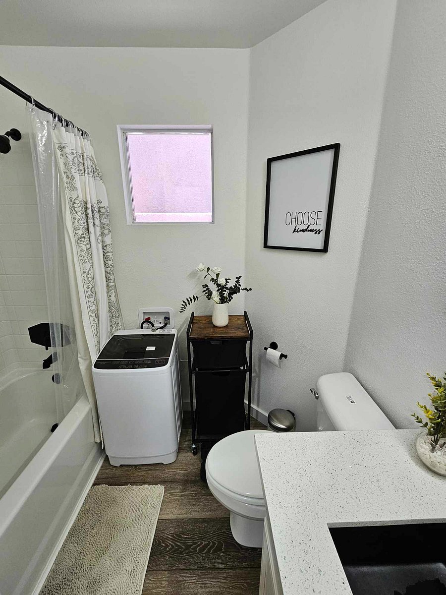 Full size bathroom. Tub shower, toilet, sink- all modern
