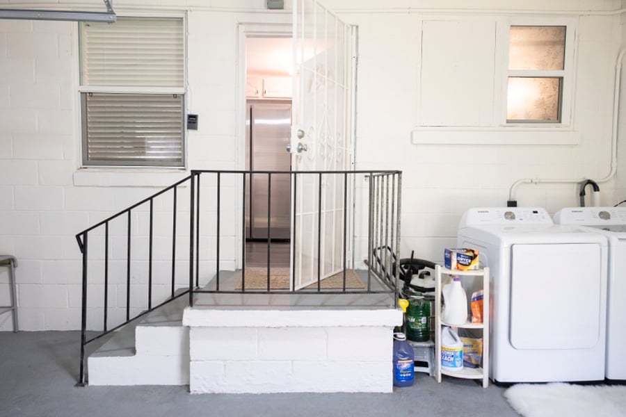Garage with washer and dryer from kitchen