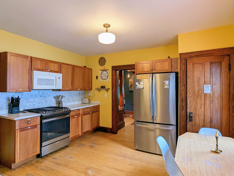 Full kitchen with new stainless steel gas stove/ oven, microwave, new stainless steel fridge, freezer, toaster, and everything you need to make your own meals (besides the food, of course)