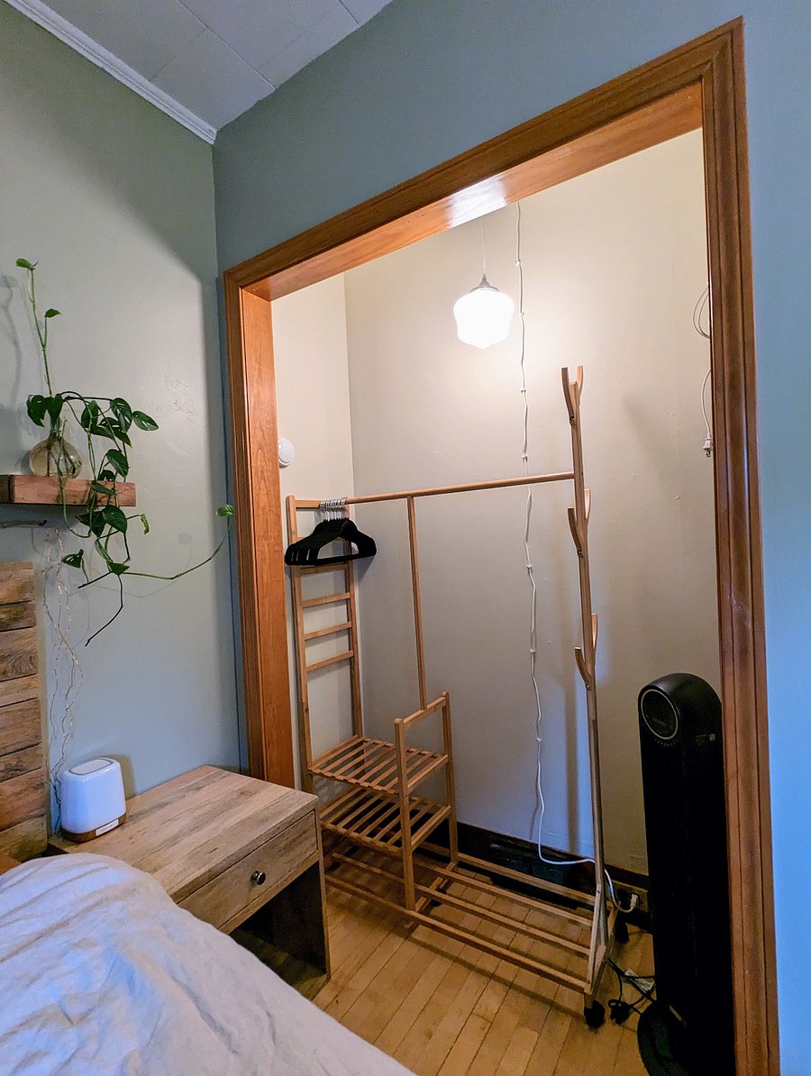 Downstairs closet, with fan, space heater 7 ironing supplies