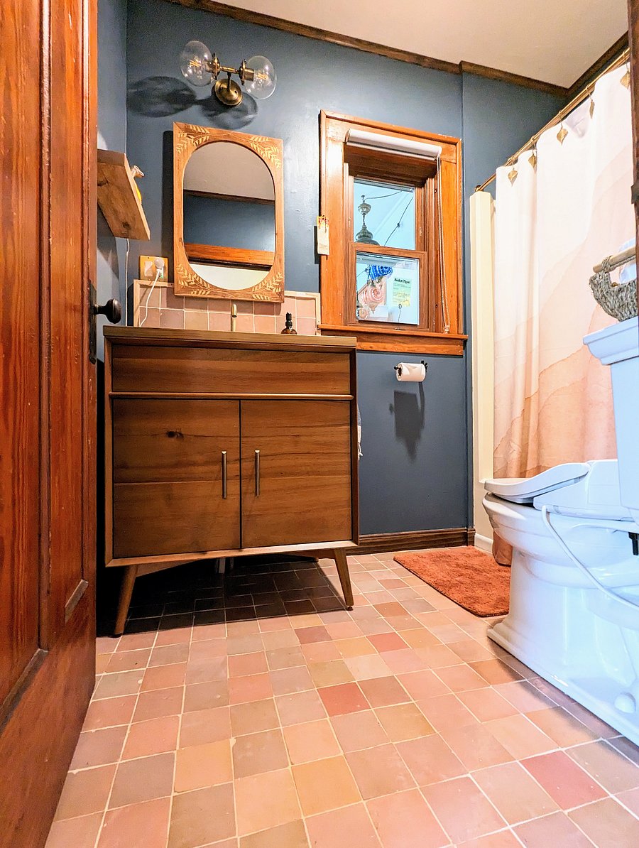 Newly renovated bathroom with a heater floor (with Moroccan zellige tile), teak vanity with a local spalted maple top, medicine cabinet, toilet with a heated seat & bidet, heated floor, and a full shower/bathtub
