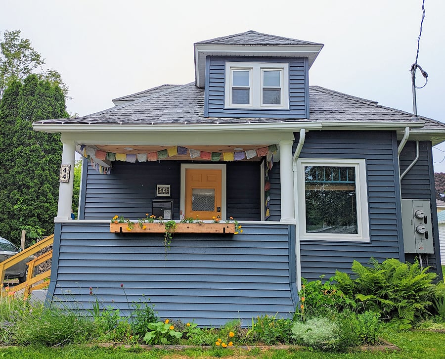 Welcoming home with brand new siding (and electric and plumbing)