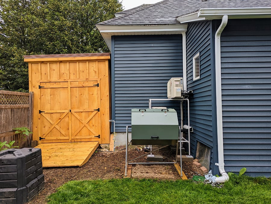 I collect compost, which is used in my backyard garden. The shed has a few sleds that can be used by guests.