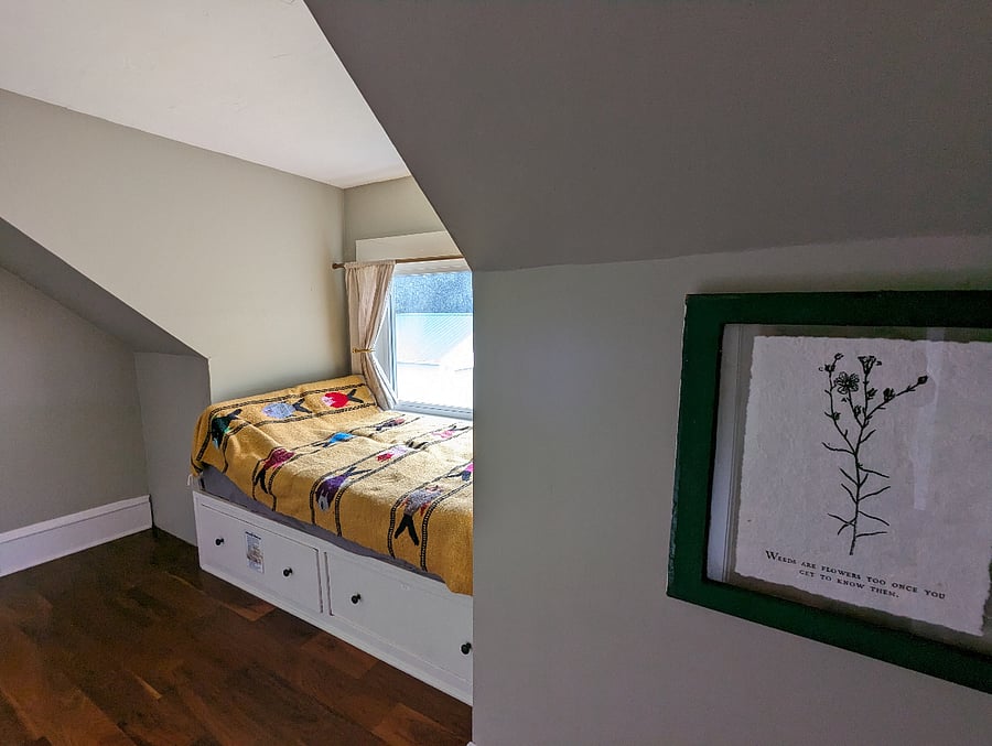3rd bedroom with a reading nook. A full-sized inflatable mattress is provided in the drawer below.