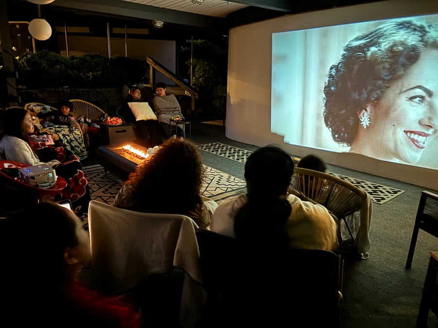 Turn the front patio into an outdoor movie theater, projector included!