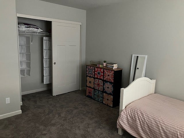 closet in one of bedrooms facing street