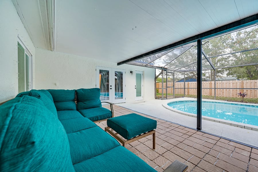Fully enclosed patio with furniture