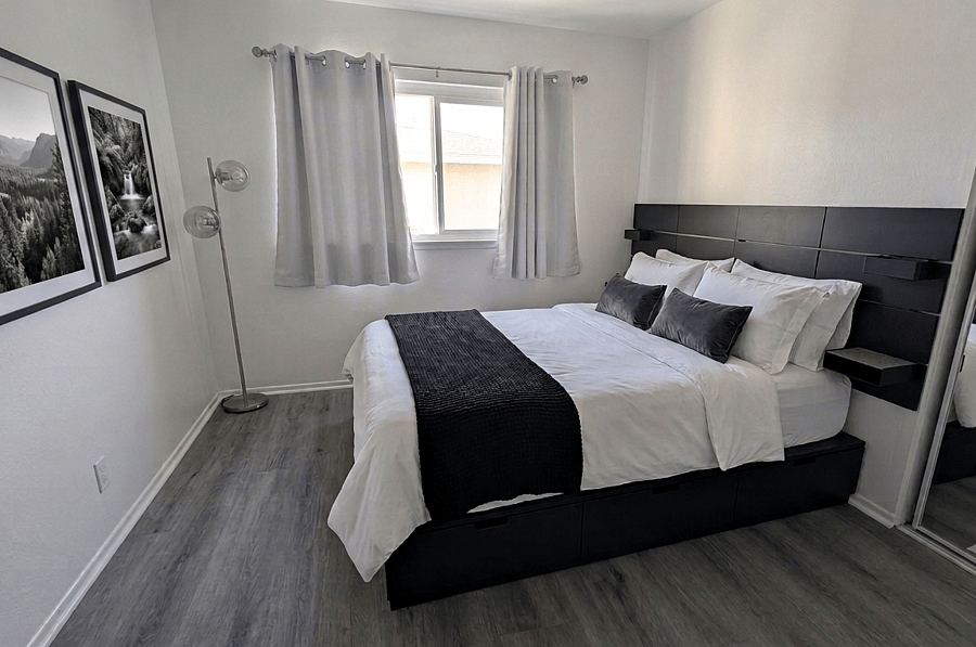 Bed has drawers at the bottom for storage and room has a standard sized closet. 