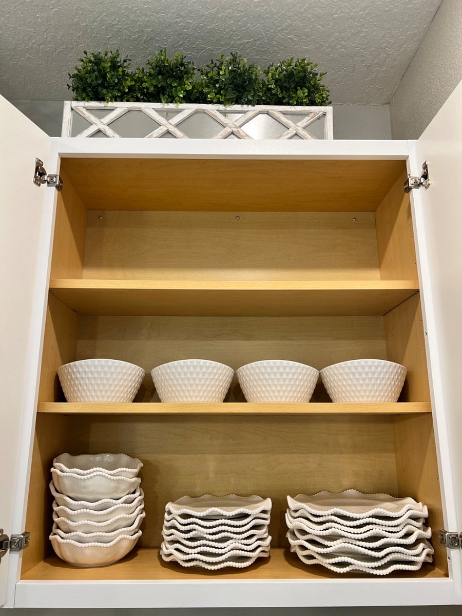 Fully stocked kitchen plates, cups, pots and pans