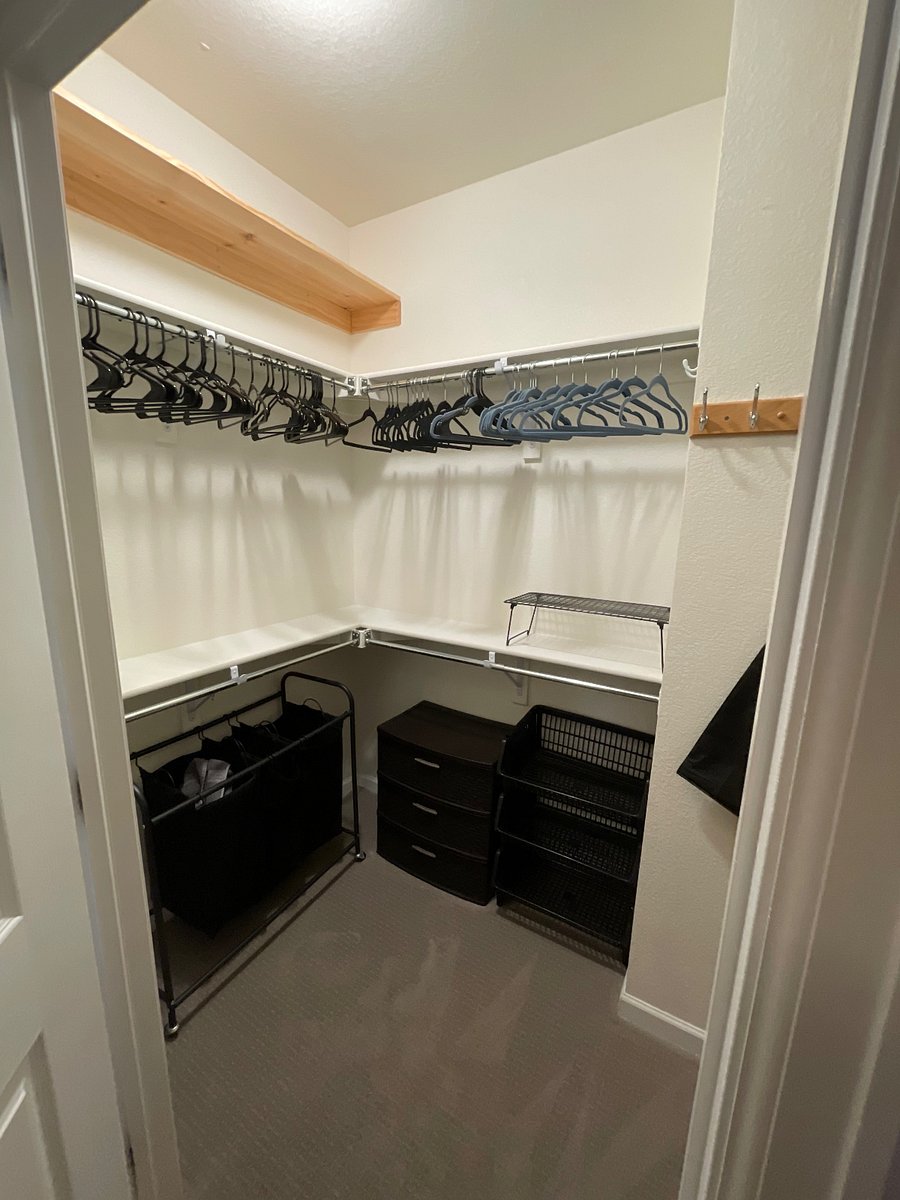 Large Walk-In Closet with Dresser and shelving