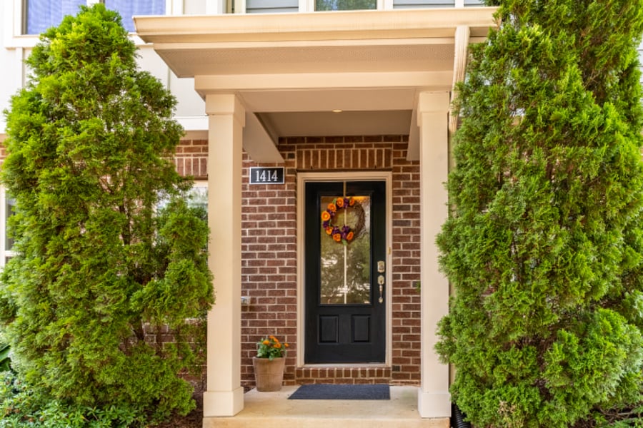 Front door, which is walking distance to a community enclosed play area for kids.