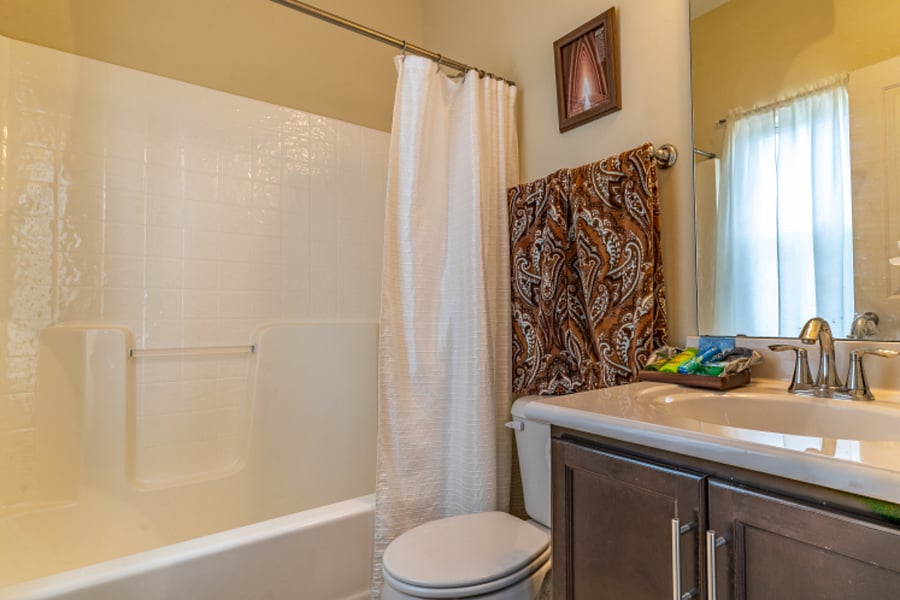 Second bedroom's full size bathroom on the third level.
