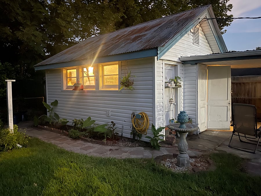 Garage where you can store a few things. Also where washer and dryer are located 