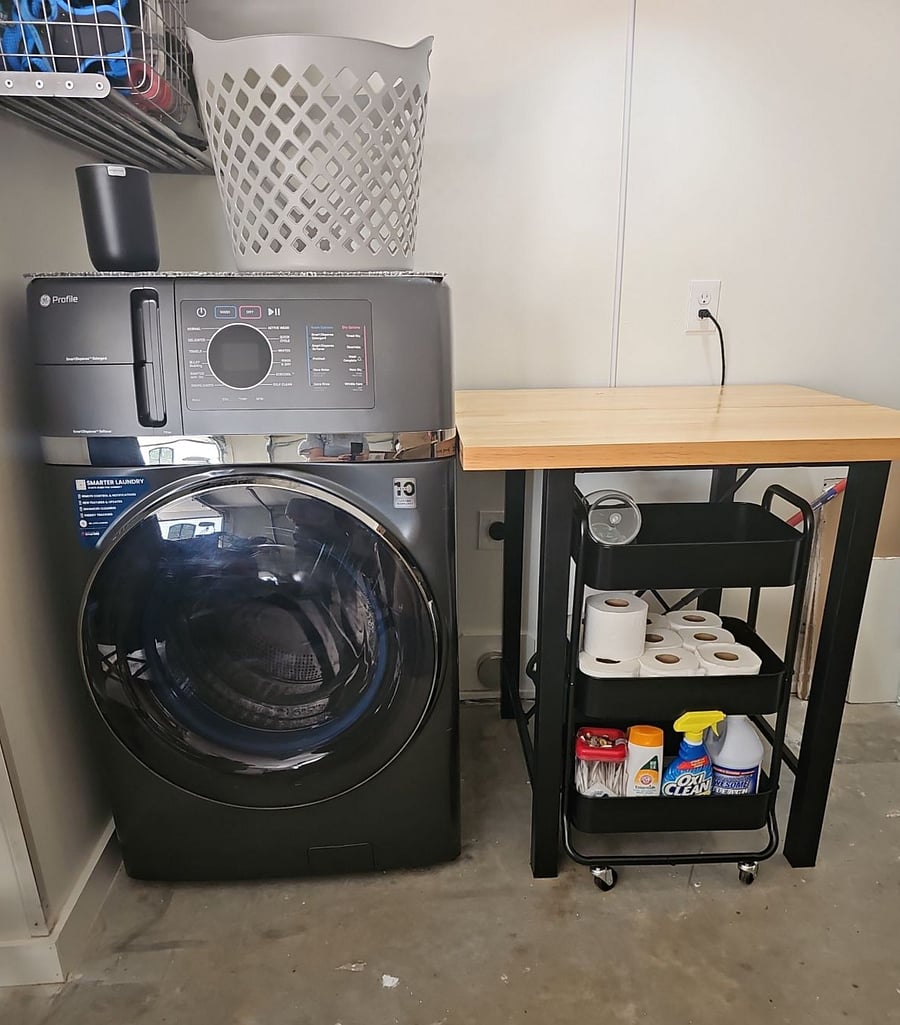 GE Washer/Dryer Combo with large 4.8 cu ft. capacity. Folding table and starter supplies available. This is located in the downstair portion of the garage.