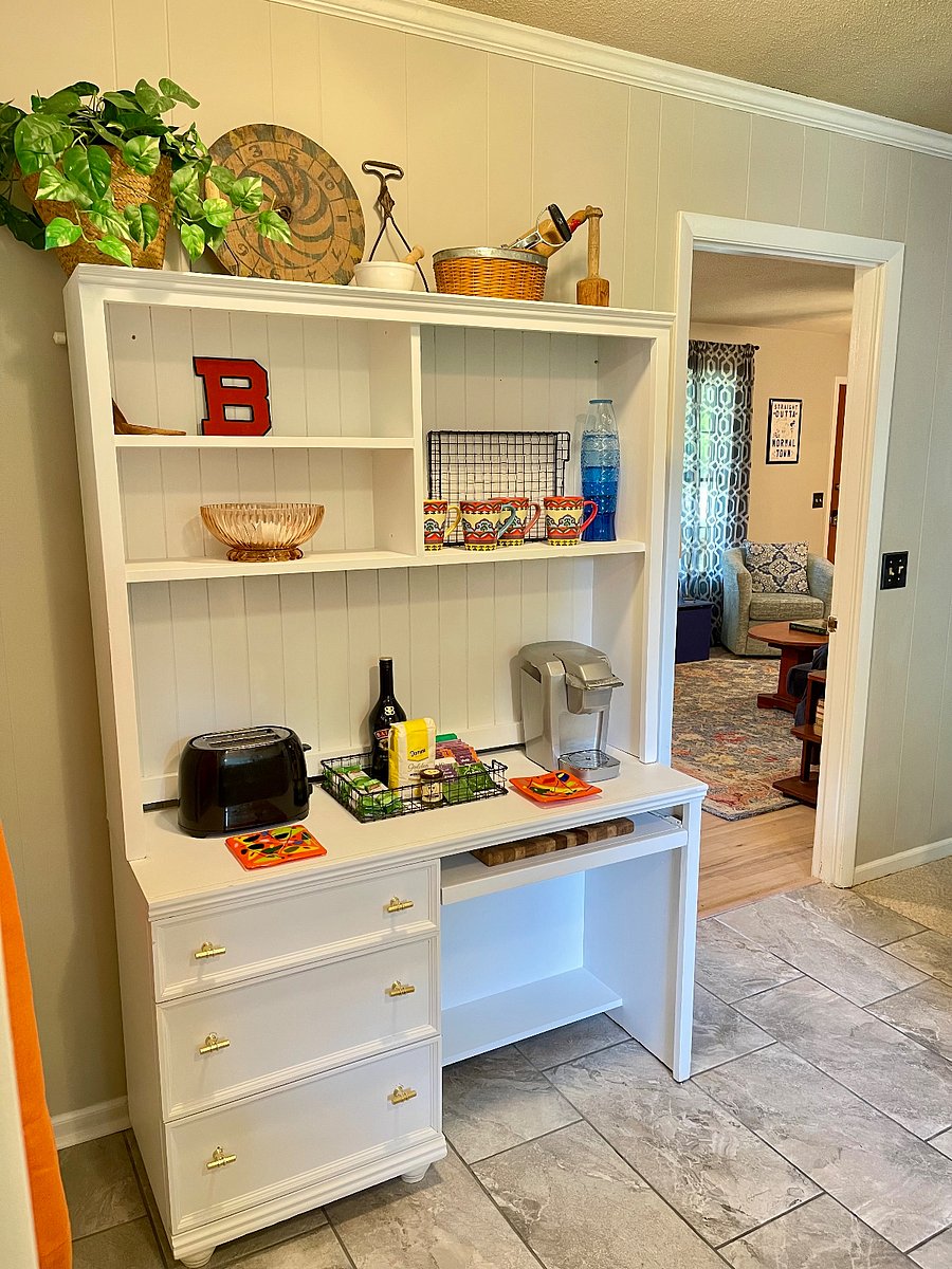 Our coffee and tea bar is ready anytime youre ready for a cup. A Keurig coffee maker and coffee pods make for an easy and quick cup of Joe. Easy access from the fully loaded Kitchen to the Den, the Living Room, and the Pantry/Laundry Room.