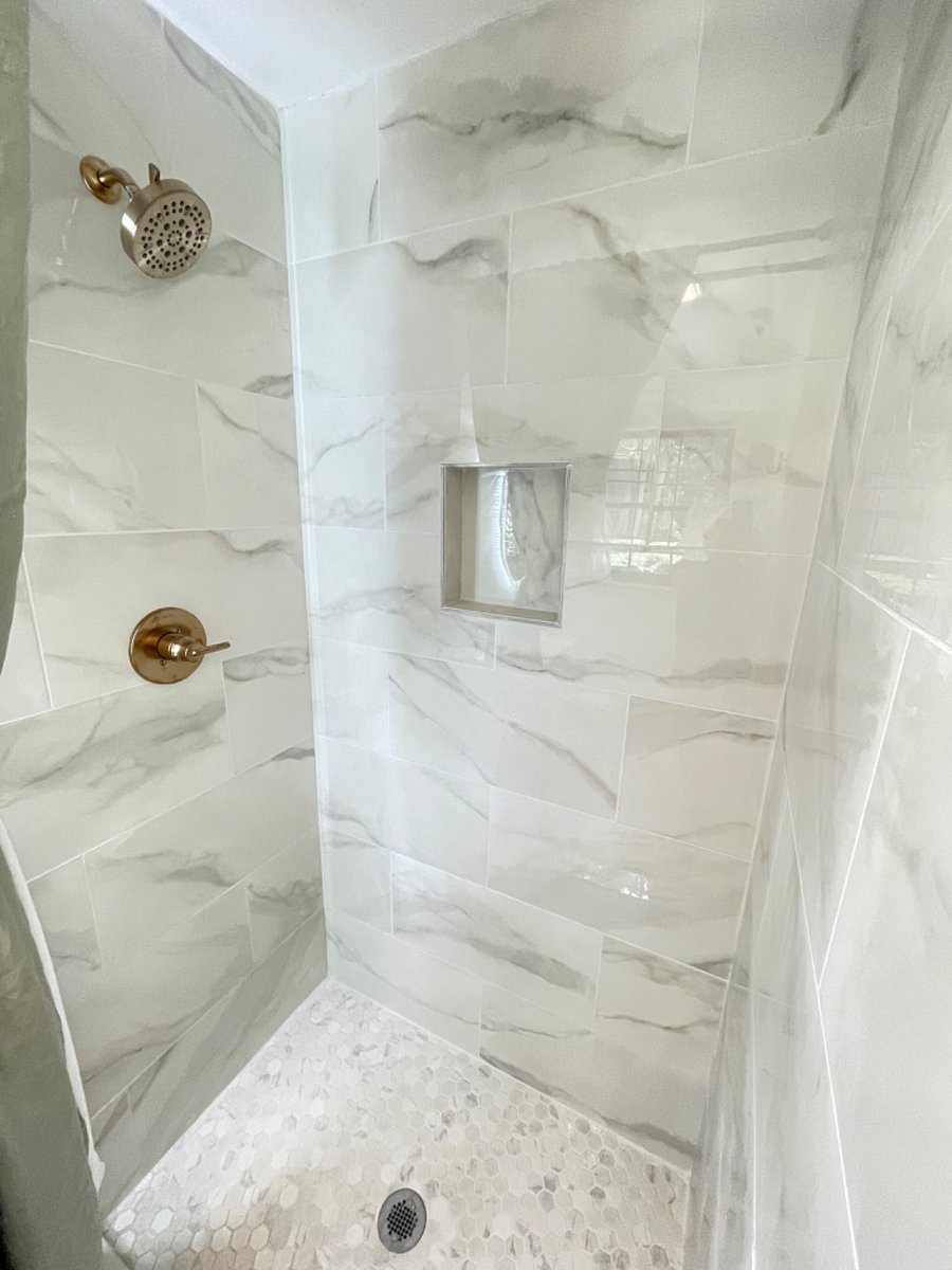 Pamper yourself in the spa-like newly renovated shower in the Primary Bedroom en suite Bathroom 1.