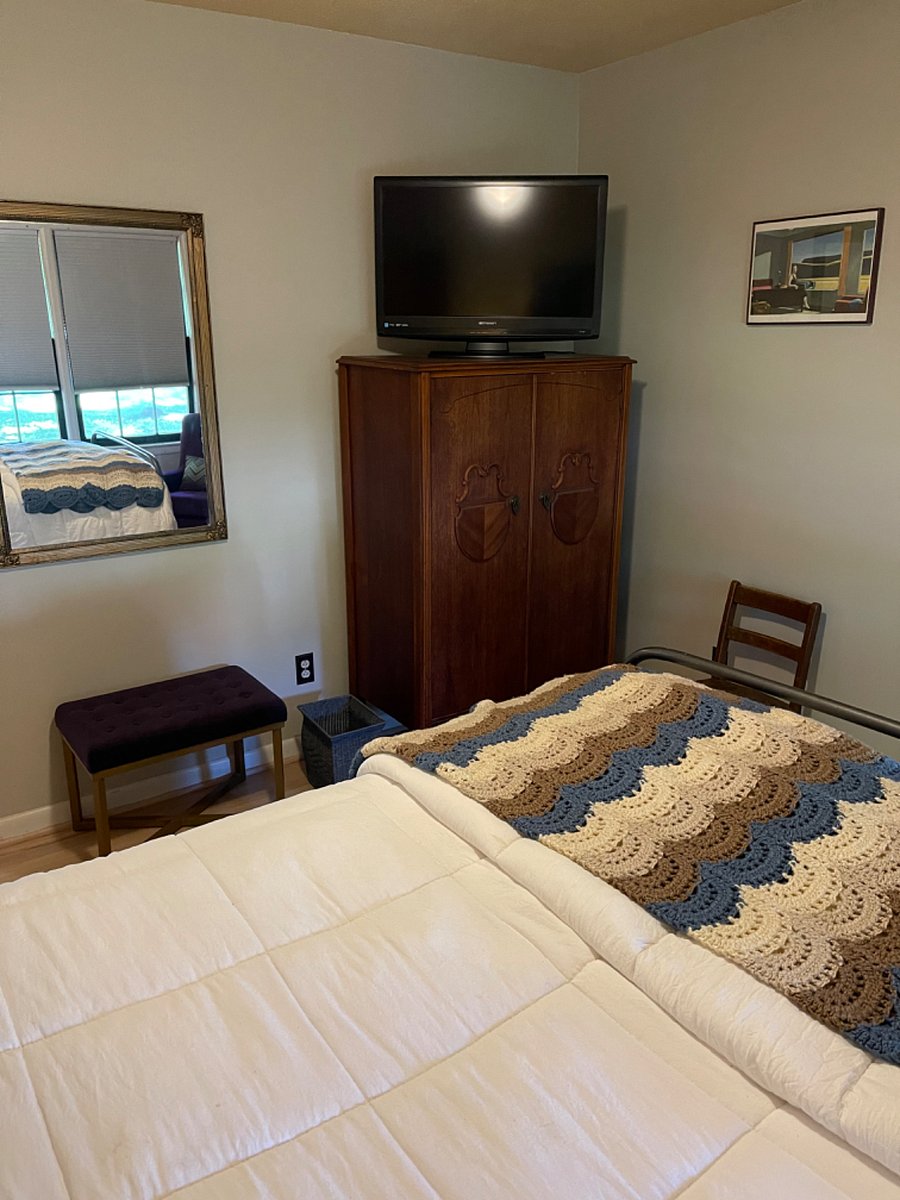 Watch a movie as you begin to drift into dreamy slumber in Bedroom 2.