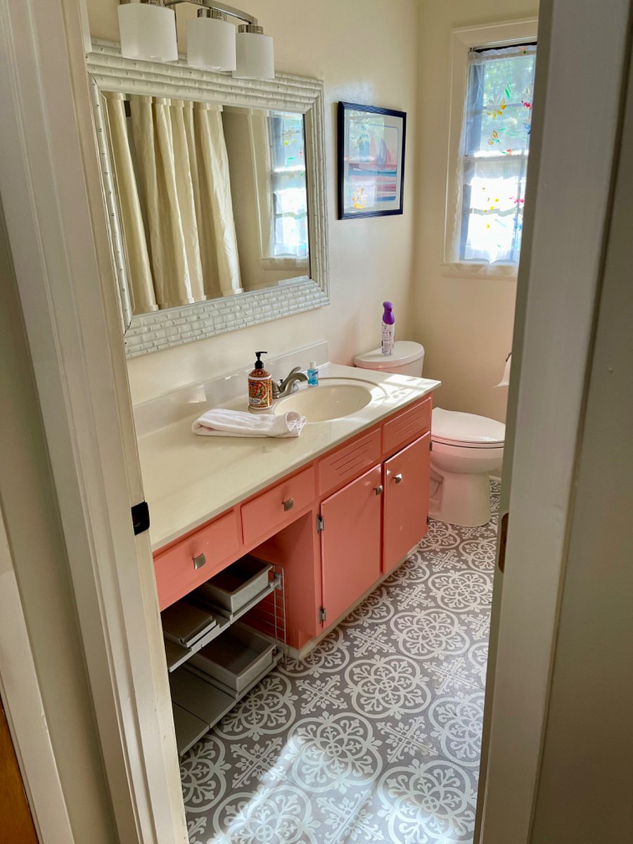 The large and welcoming main Bathroom 2 is easily accessible for guests staying in Bedrooms 1 and 2. 