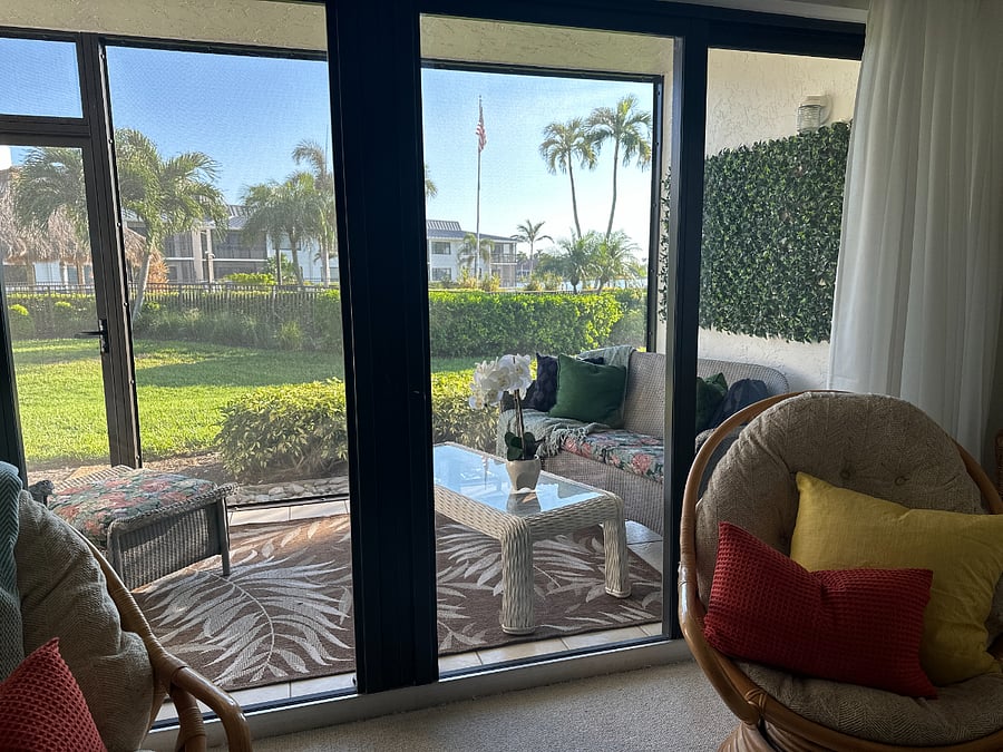 Screened lanai, wlak out directly to heated pool, manicured lawn and dock area.