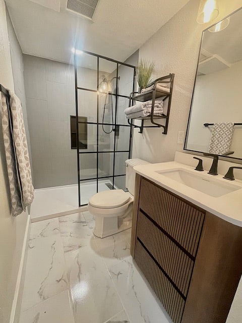 Master Bathroom has a walk-in shower, shower faucet with handheld sprayer
