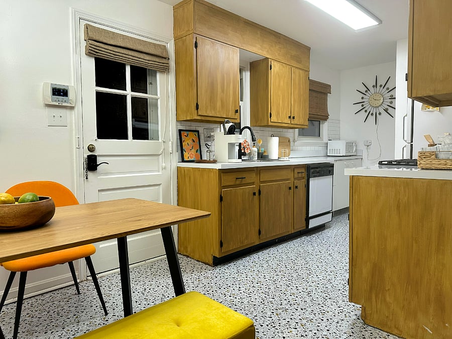eat-in kitchen with door to backyard and deck
NOTE: dishwasher replaced 2/2025