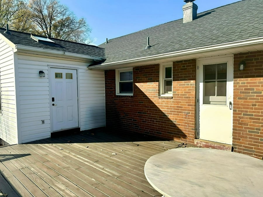 deck with door to kitchen on right (door to en suite bath on left)