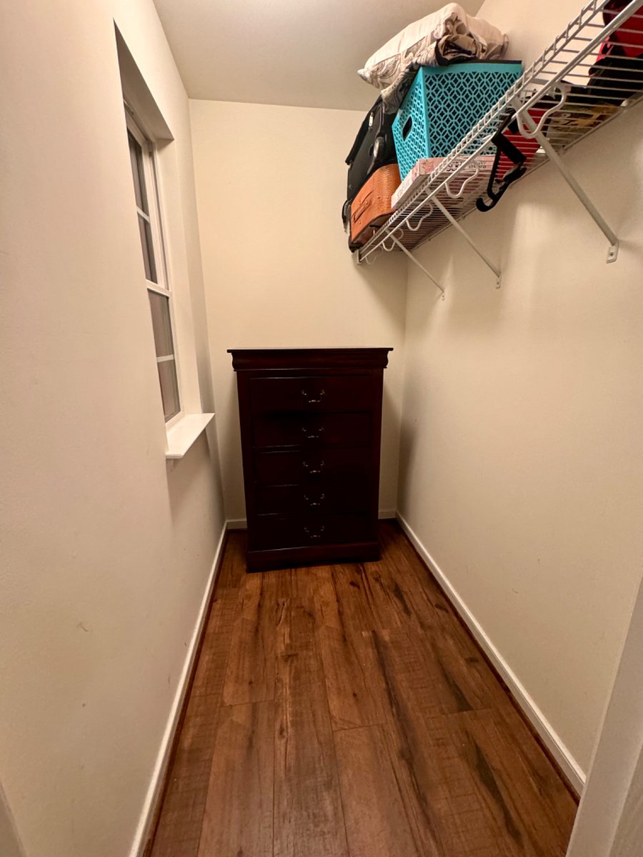 Walk In Closet with dresser