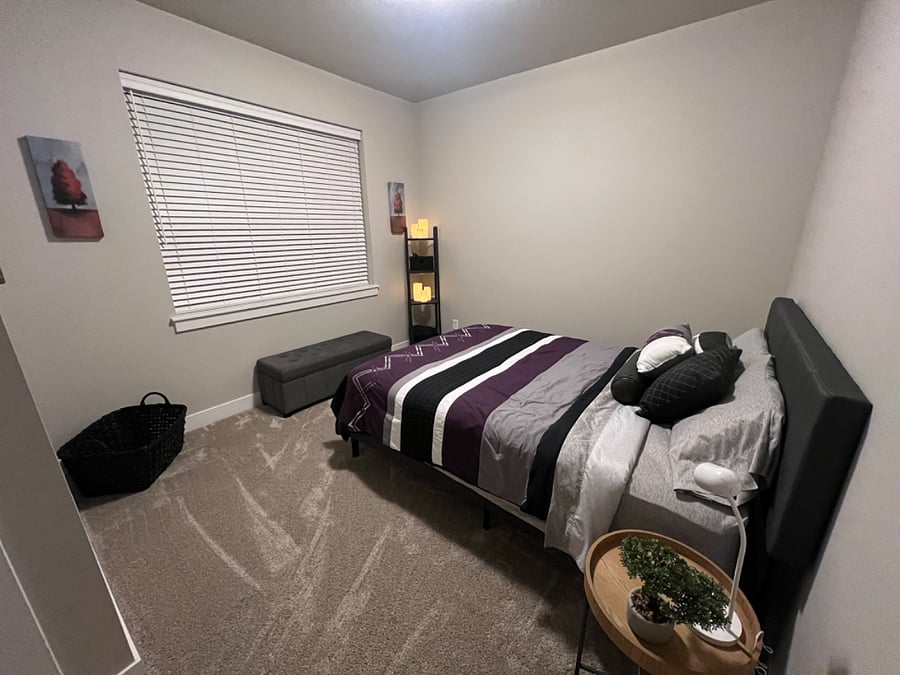 Guest bedroom - cozy and chic features an en-suite bath and a walk in closet