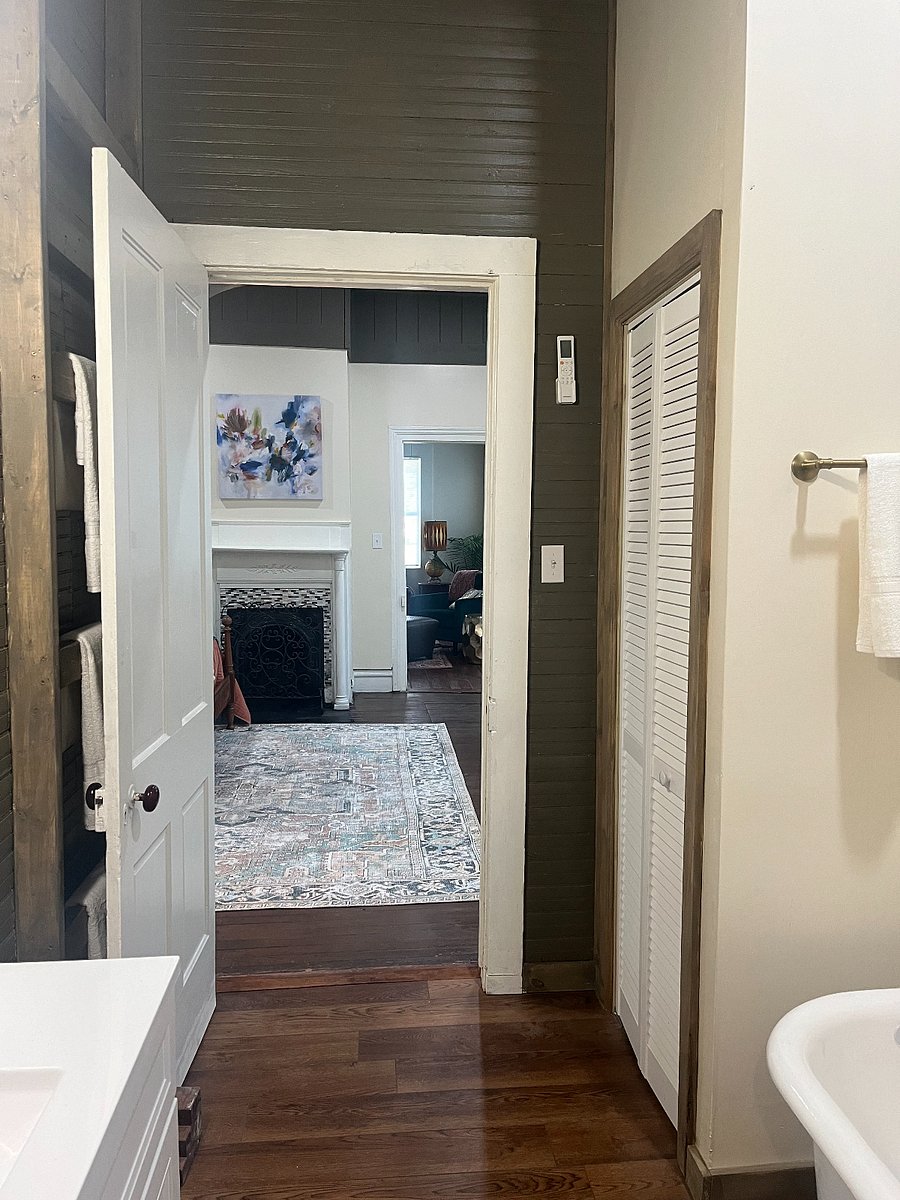 View from large bathroom into bedroom #1