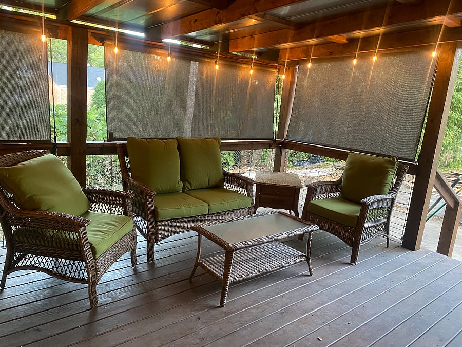 Back deck seating area with privacy shades