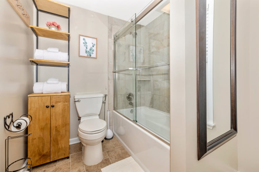 Full bath/shower. Toilet has bidet. Also includes hairdryer, curling wand & flat iron.