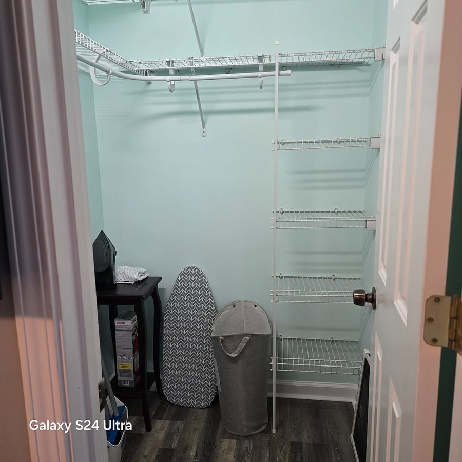 Bedroom Closet
Iron, Ironing Board, Broom and Dust Pan located