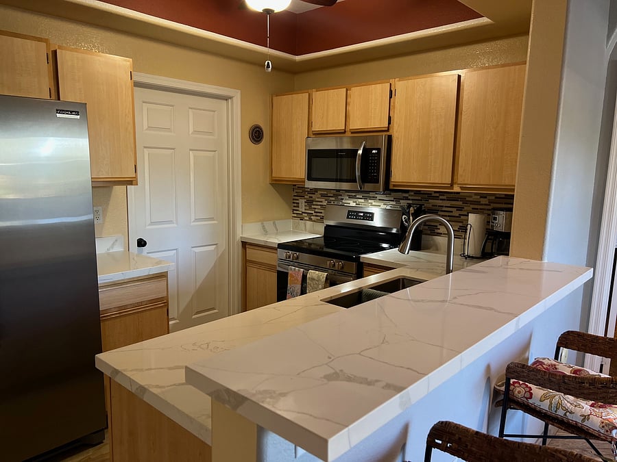 New Quartz Counter Tops, Deep Stainless Steel Double Sink and kitchen Faucet