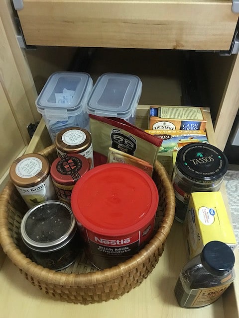 Coffee pot, coffee and tea provided.