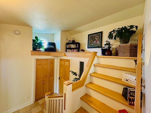 Reading nook above, closet and door to garage below.