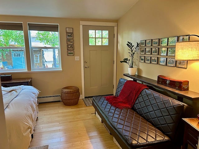 Bedroom with door to back patio and garden.