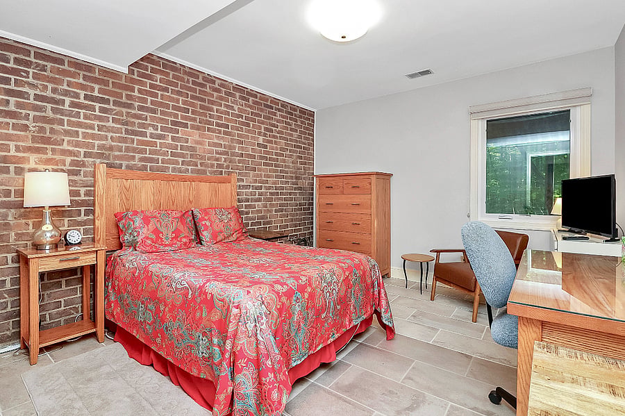 Full size bed. Window has room darkening shade.