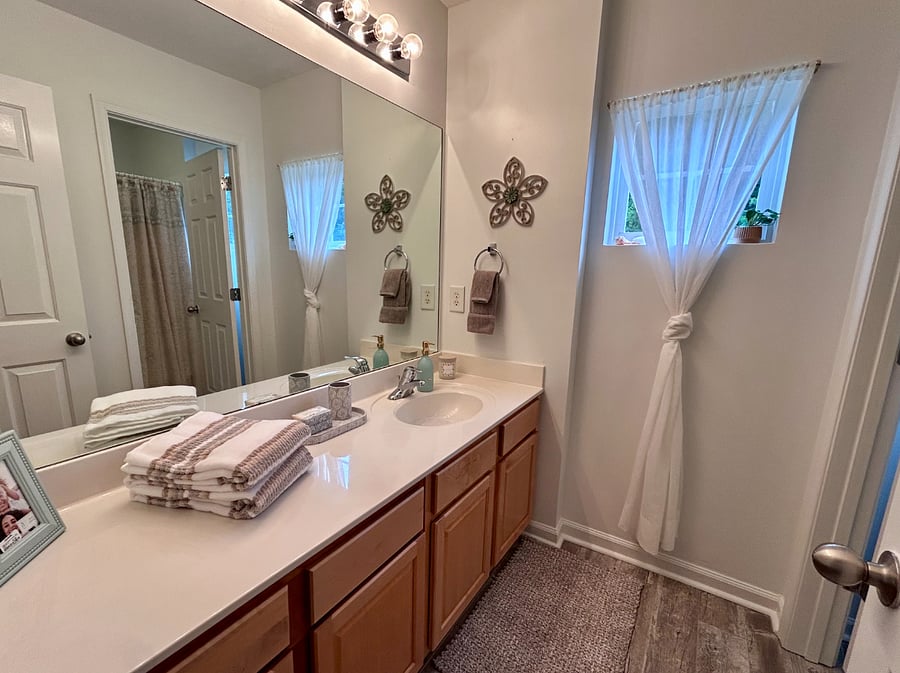 Full bathroom upstairs with separate toilet & shower/tub.