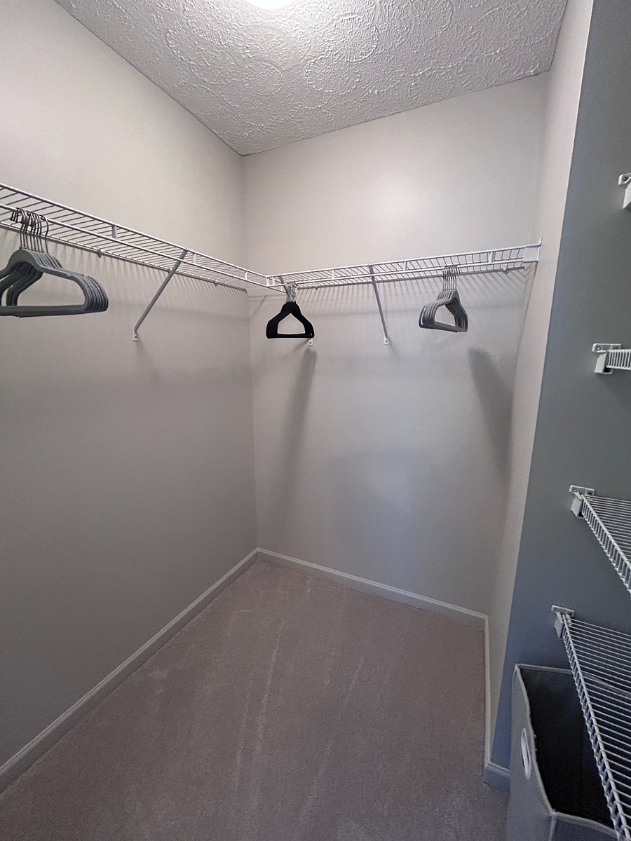 Upstairs bedroom walk in closet