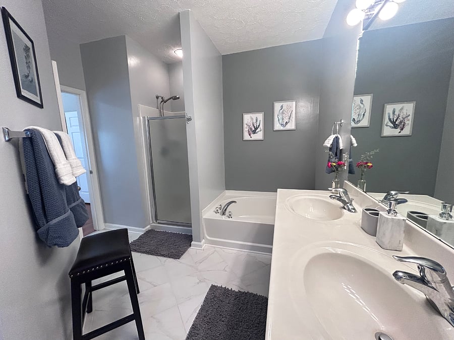 Primary bathroom with separate shower & tub.