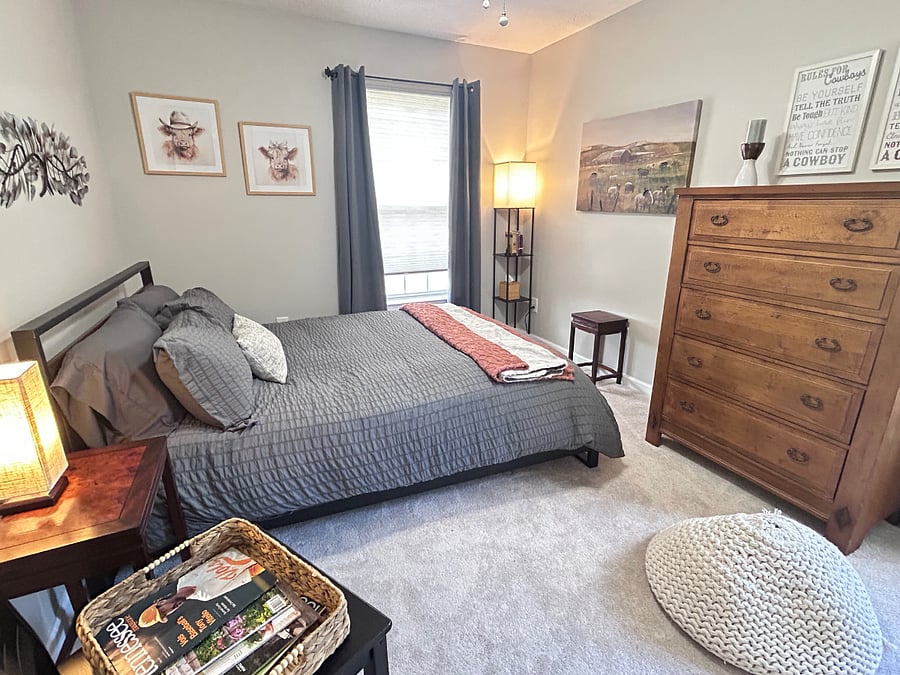 Upstairs bedroom with high end mattress & bedding plus view of hillside & large walk in closet.
