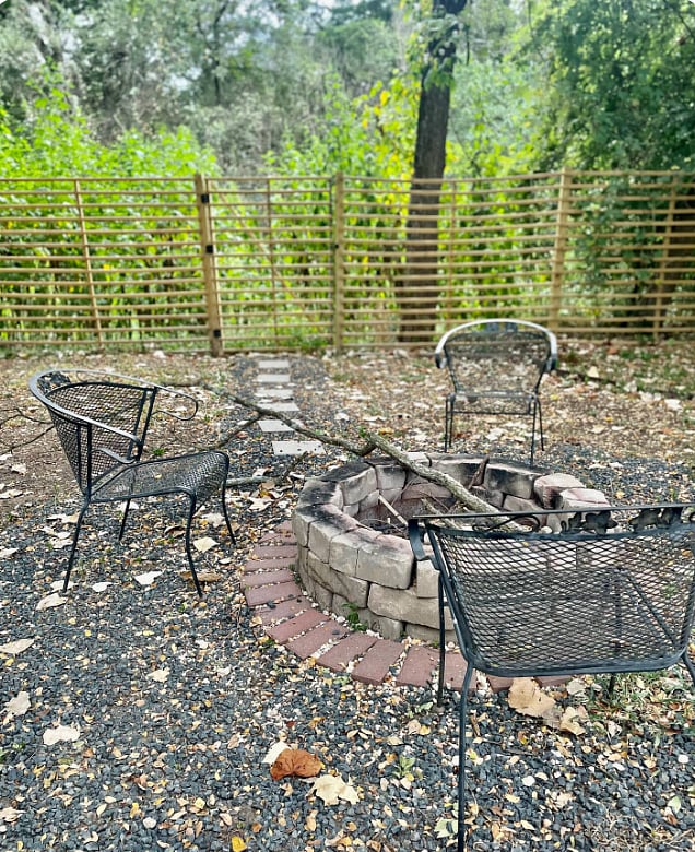 Fire pit facing the creek (deck and cowboy pool is right behind the photographer.