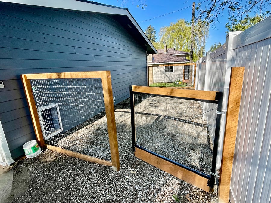 dog kennel area, attached to the garage.