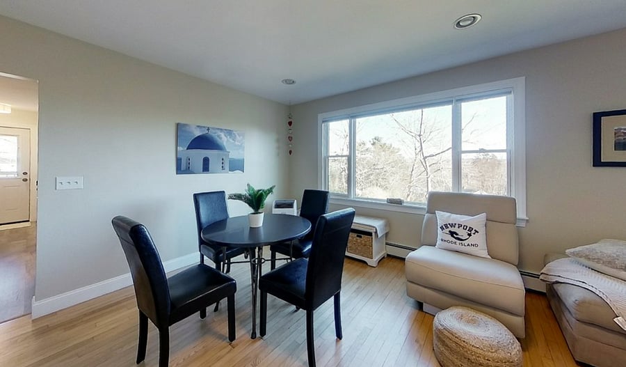 Dining area can seat six with two additional chairs located in walk in closet.
